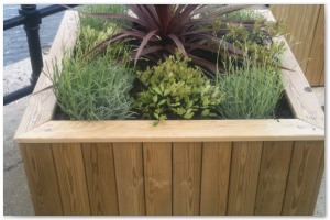 Decorative wooden planters supplied and installed by Lyndhurst Landscaping and Maintenance