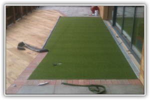 Patio, decking and artificial grass installation, New Forest