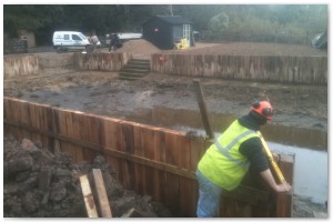 Dock refurbishment works, clearing the old dock of silt and buildup, reinforcing embankments and landscaping surrounding land.