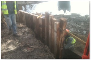 Dock refurbishment works, clearing the old dock of silt and buildup, reinforcing embankments and landscaping surrounding land.