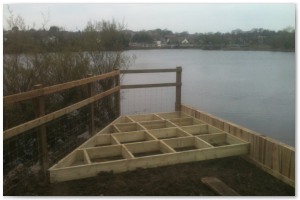 Dock refurbishment works, clearing the old dock of silt and buildup, reinforcing embankments and landscaping surrounding land.