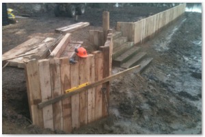 Dock refurbishment works, clearing the old dock of silt and buildup, reinforcing embankments and landscaping surrounding land.