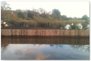 Dock refurbishment works, clearing the old dock of silt and buildup, reinforcing embankments and landscaping surrounding land.