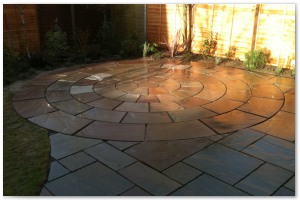 Indian sandstone patio and circular paving installation in Lymington, Hampshire
