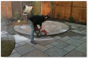 Indian sandstone patio and circular paving installation in Lymington, Hampshire