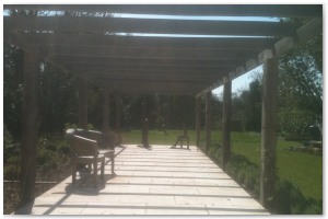 Bespoke oak pergola to the customers specifications. Supplied and installed by Lyndhurst Landscaping and Maintenance.