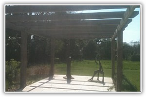 Bespoke oak pergola to the customers specifications. Supplied and installed by Lyndhurst Landscaping and Maintenance.