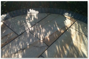 Multi level indian sandstone paving leading to waters edge at Hythe Marina, Hampshire