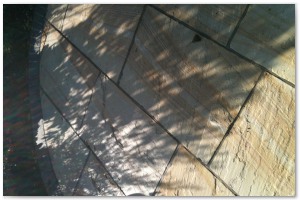 Multi level indian sandstone paving leading to waters edge at Hythe Marina, Hampshire